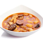 Judiones con Cochinillo